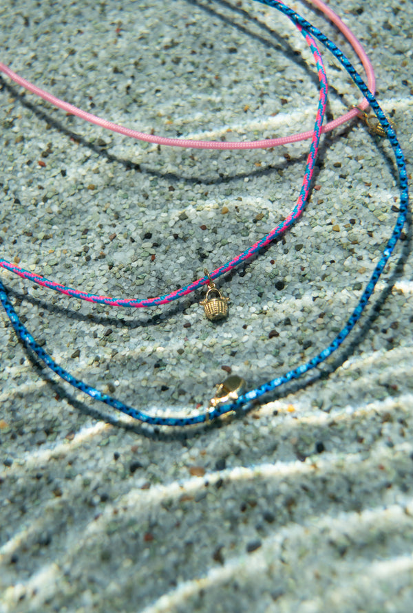 a tiny nantucket basket necklace