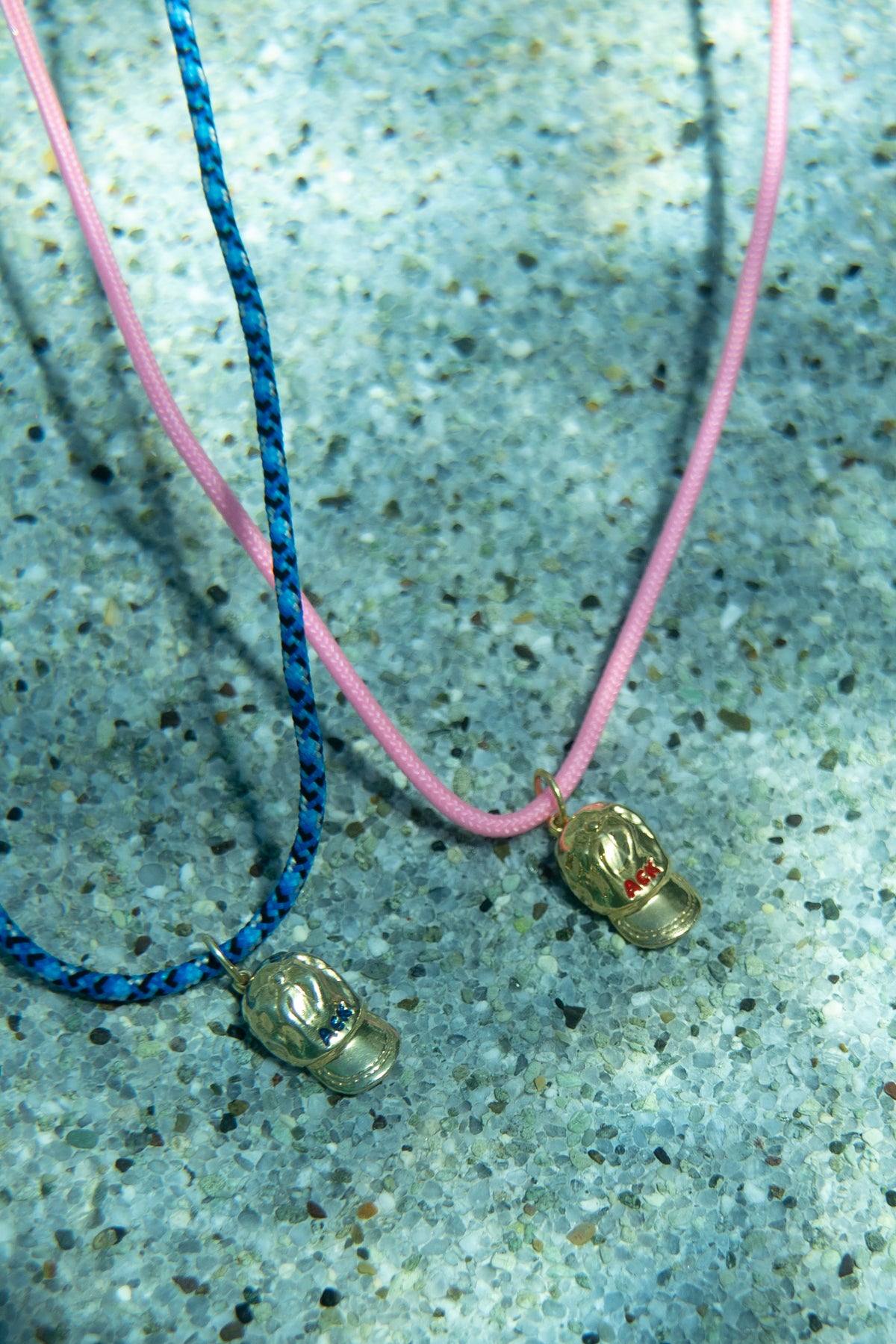 ACK hat necklace