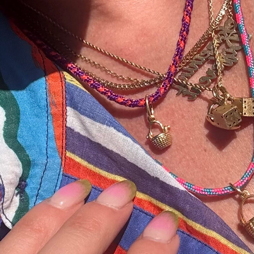 a tiny nantucket basket necklace