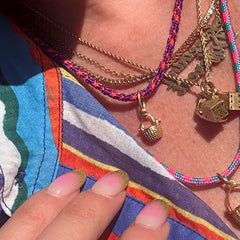 a tiny nantucket basket necklace
