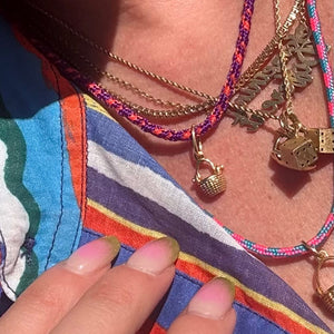 a tiny nantucket basket necklace