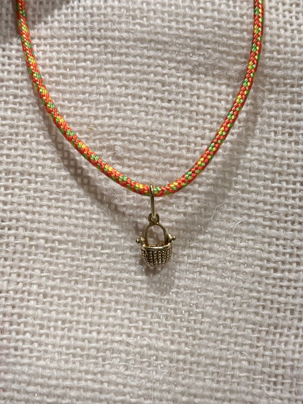 a tiny nantucket basket necklace