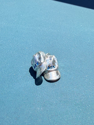a salty ACK hat necklace