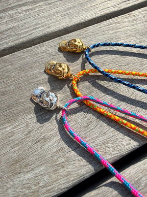 a salty ACK hat necklace