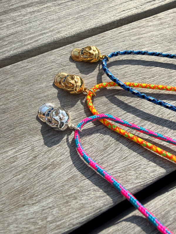 a salty ACK hat necklace
