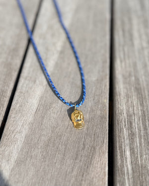 a salty ACK hat necklace