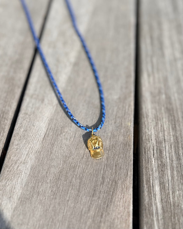 a salty ACK hat necklace
