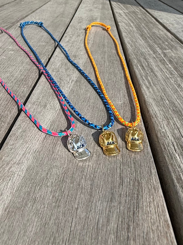 a salty ACK hat necklace