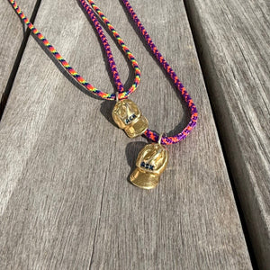 a salty ACK hat necklace