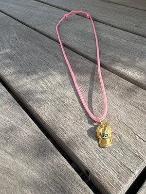 a salty ACK hat necklace