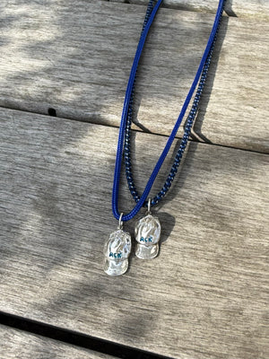 a salty ACK hat necklace